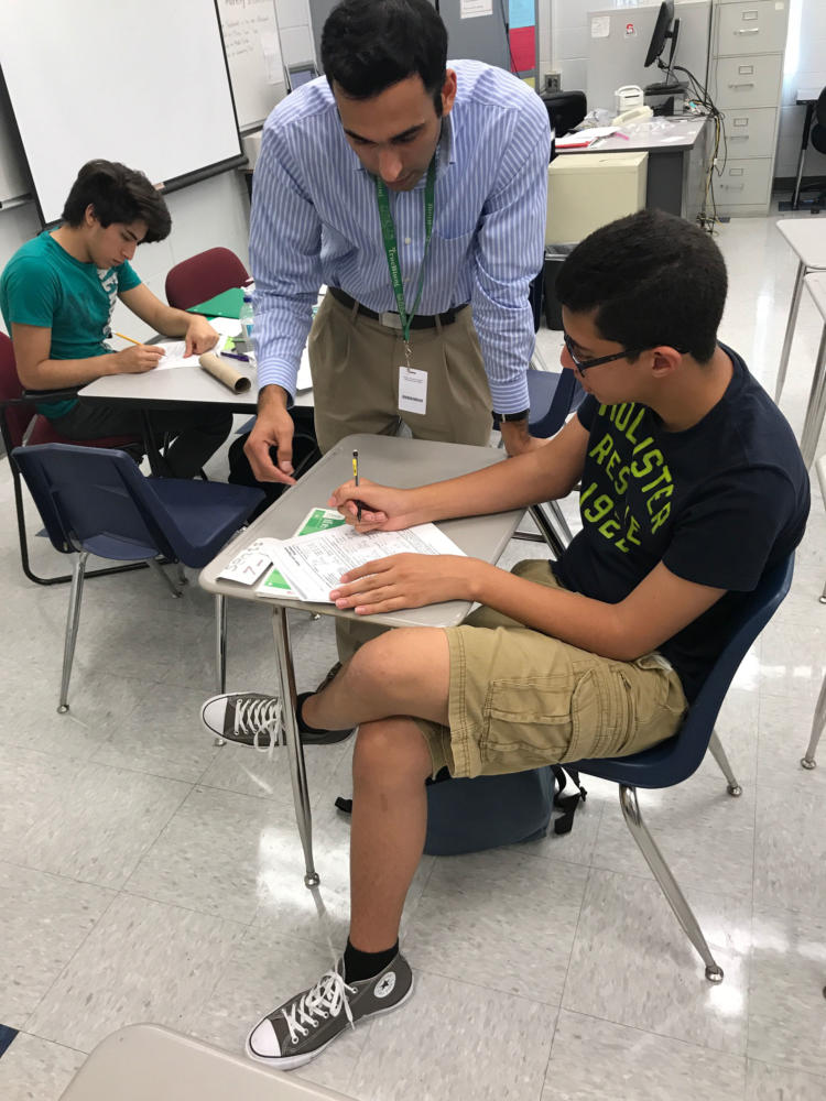 Cheema offers tutoring in his room four days a week after school in order to ensure that his students are truly understanding and excelling in the material that he teaches. On Tuesday August 22, Mr. Cheema worked diligently after school to help student Zacharia Elshaer with his homework.
