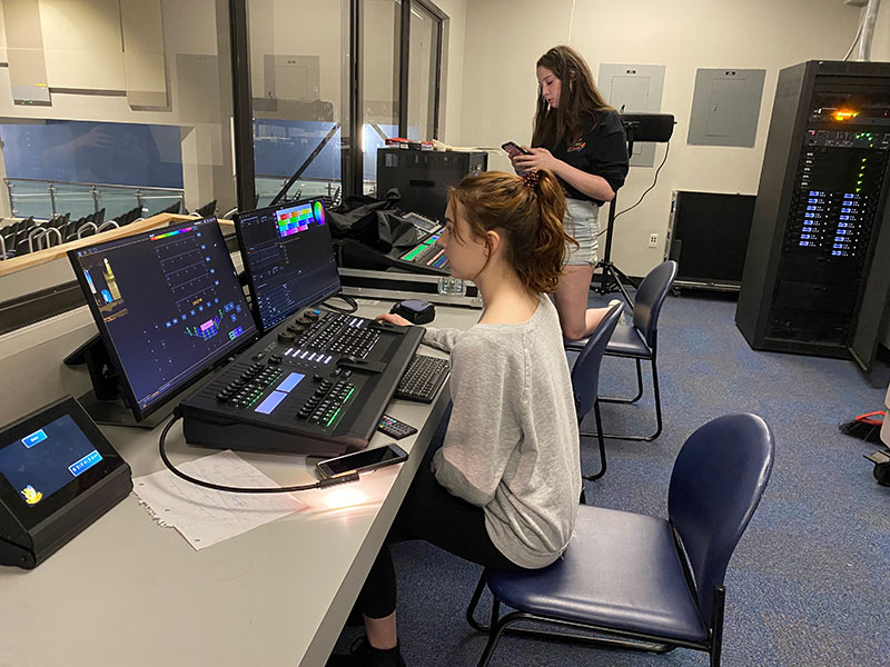 Sophomores Laura Howell and Ashley Welch play with the sound- and light boards on a set building work day. Definitely the people helping me with the lights got me interested, Welch said. You learn teamwork better- how to work with your peers that you dont really know much.