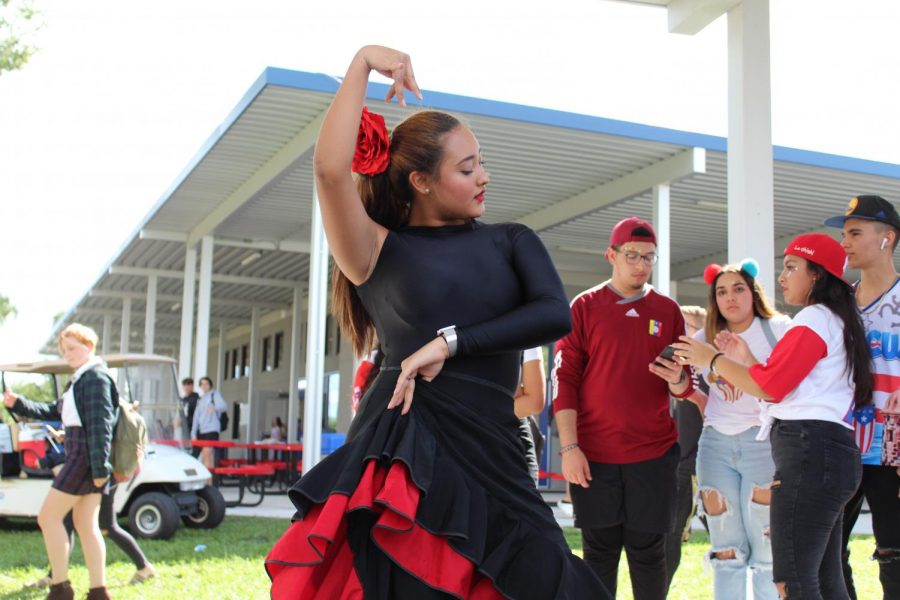Junior Ashley Gomez dances flamenco at the Hispanic Heritage Festival during both A and B lunch.