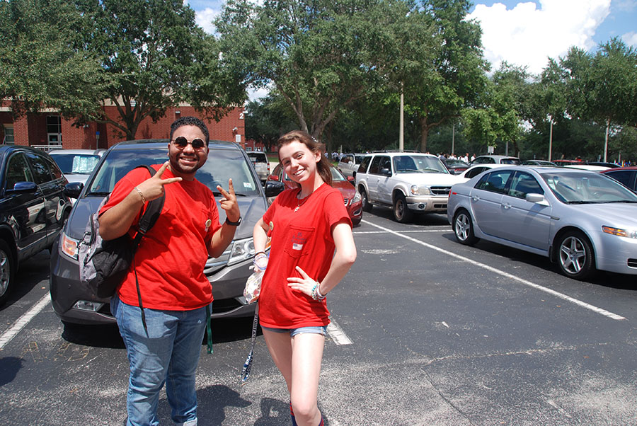 Student Body President, Carlos Oquendo Beltrán, and Student Body Secretary, Grace Pope, assist with lining up the homecoming court during the Homecoming Parade on September 7. Pope and Beltrán planned the homecoming festivities, including the dance, parade, and spirit days, along with the rest of the Leadership class.
