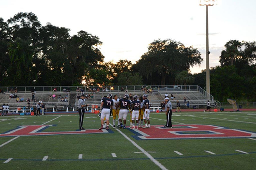 On September 7, the Brantley football team captains meet with the referees and the Winter Haven Blue Devil captains prior to the start of the homecoming game. Lake Brantley beat Winter Haven 35-28, this was LB’s  first win of the season.