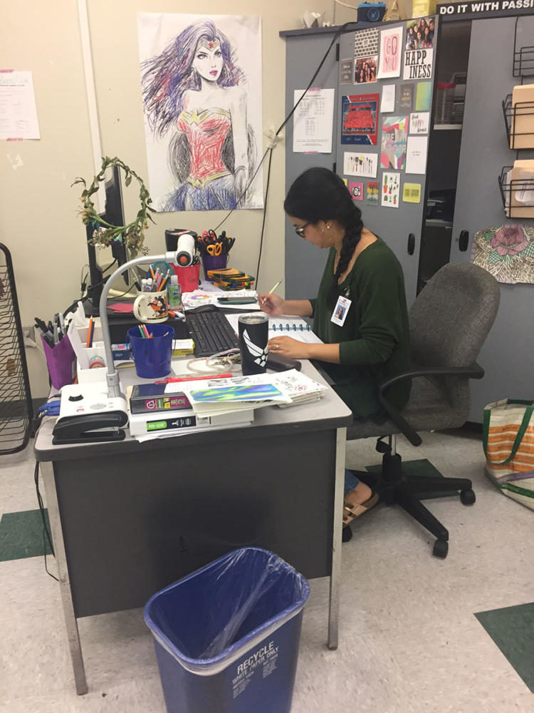 Art and photography teacher, Ariana Fizudeen prepares her lessons for the day. Fizudeen is one of the many new teachers that was added this year to Lake Brantley.