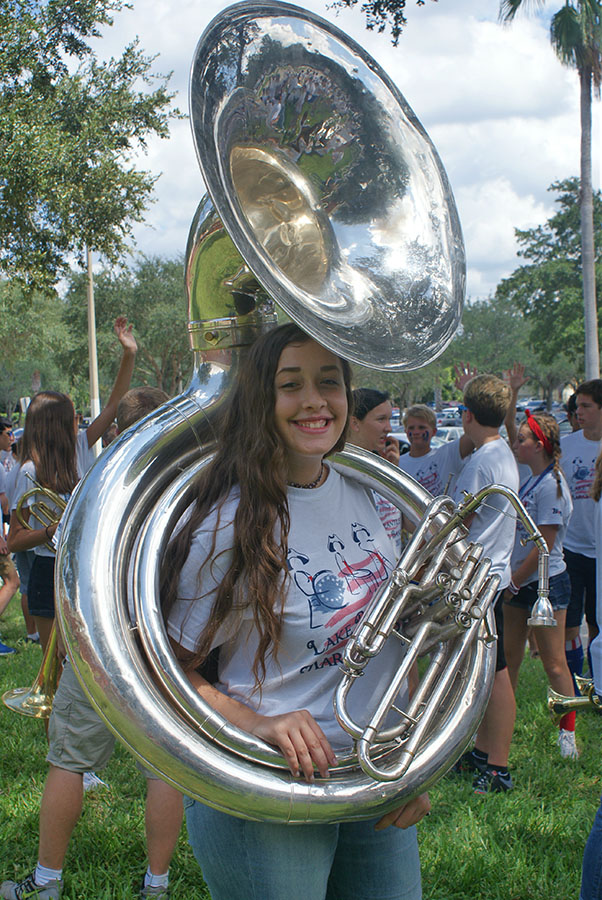 Junior Marissa Maldonado practices with the rest of the band in the student parking lot before the parade on September 7th. The band follows ROTC and plays Brantley’s fight song.