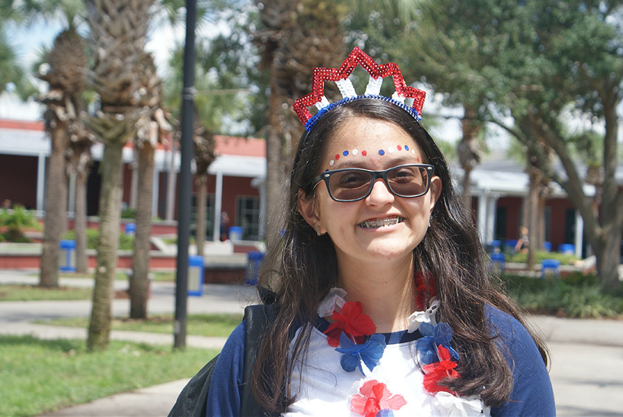 Sophomore Samarys Morales Melendez poses in the school courtyard before the parade as she heads to the student parking lot on September 7th. “I’m excited to participate in the parade,” Morales said. “And to hand things out to the kiddos at Forest City Elementary.”