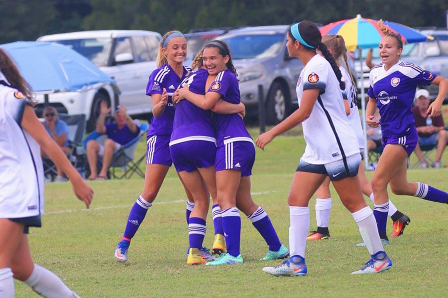 Junior Serena Ahmed celebrates after she scored a  goal. Ahmed plays holding and attacking midfield. “Scoring a goal is an exhilarating and exciting feeling,” Ahmed said. “I have scored many goals in soccer but the feelings are still the same. It makes me feel accomplished.”