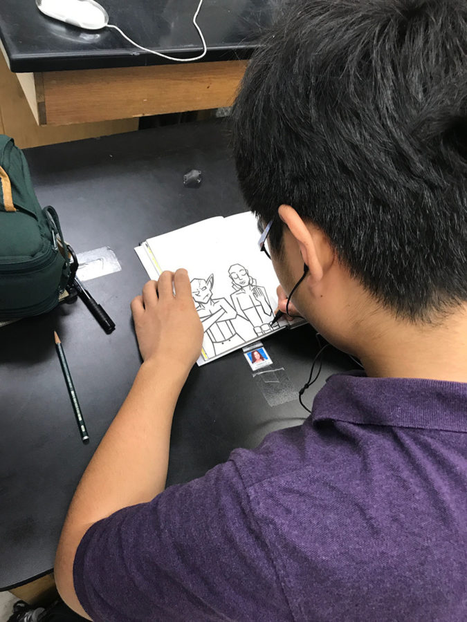 Senior Jon So completes an Inktober piece, utilizing the word ‘long’, by using markers and pens on Thursday, Oct.5. Sno avidly completed the Inktober works on their assigned days. 