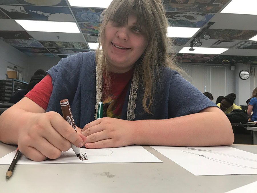 Sophomore Faith Lapp works on her Inktober piece during the National Art Honor Society meeting on Friday, Oct.6. Lapp preferred to enjoy markers for her ink medium and promptly joined the Honor Society.

