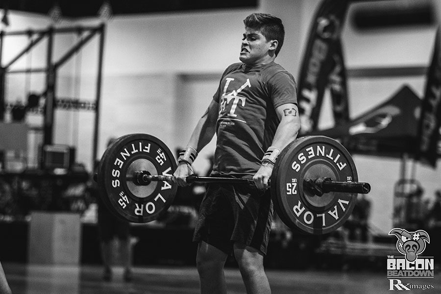 Jorquera pulls the barbell up in order to perform a clean and jerk into overhead squat during the Bacon Beatdown. Jorquera placed first in the competition in Daytona. 