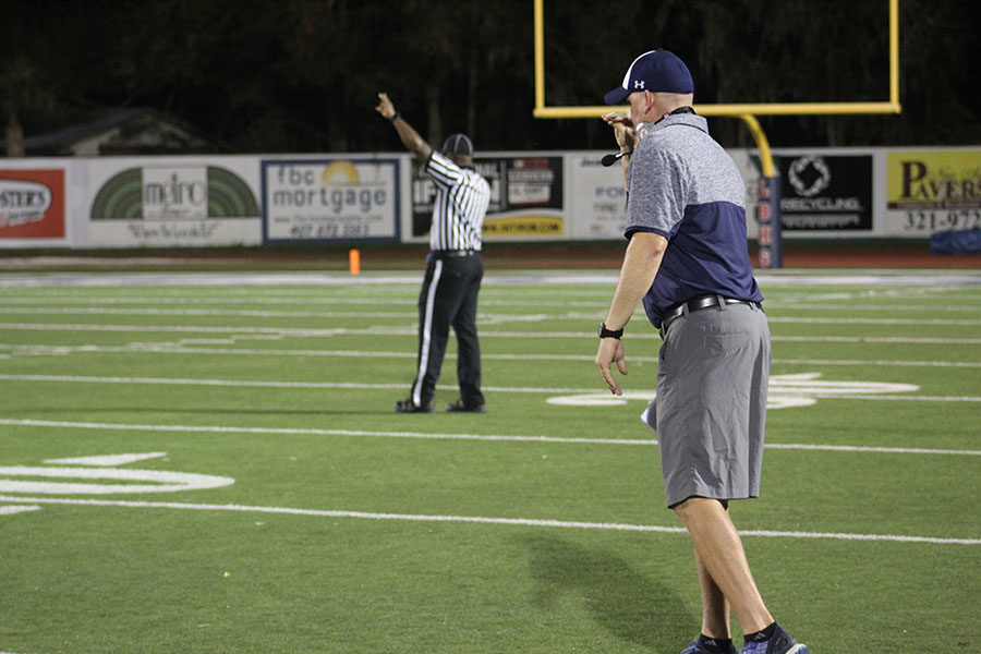 Coach Delfiacco runs a football play against Seminole High School on Thursday, Sept. 28 at the Tom Storey Field. The final score of the game was 31-6.
