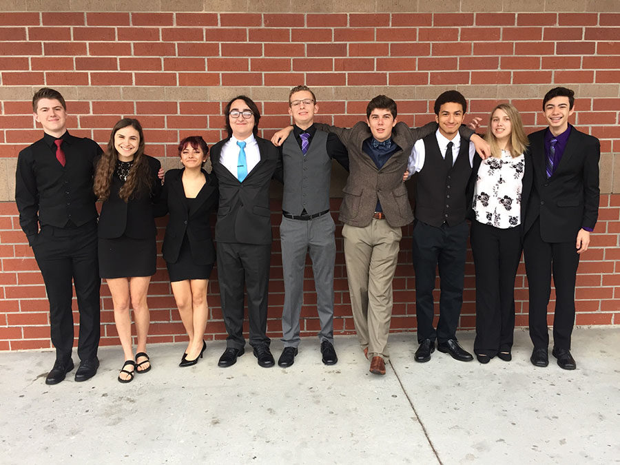 The Lake Brantley Debate Team poses together before their first round at their third competition of the season on Saturday, December 9 at Hagerty High School. Senior Grace Staudenmaier placed first in her Original Oratory competition. 