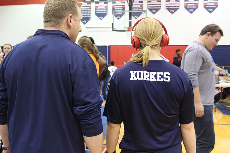 Junior Elena Korkes stands with her dad on Jan. 18 at the Lake Brantley Main gym. Korkes was one of the many girls the represented the Lake Brantley girls weightlifters at the regional weightlifting meet.