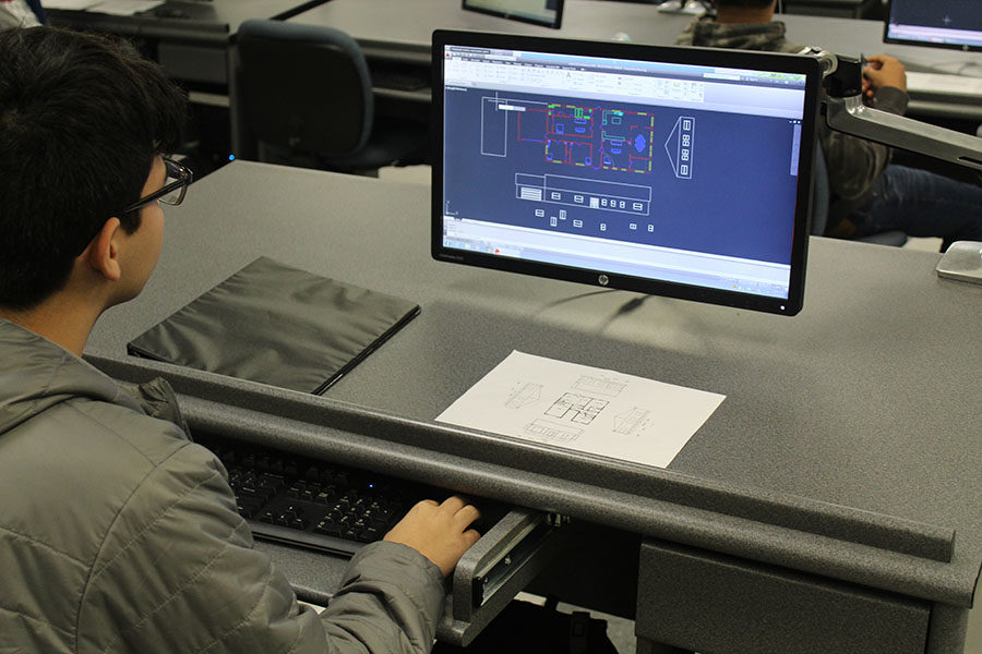 Junior Alejandro Franquez Garcia creates a digital blueprint in his 5th period Drafting Class on January 18. “I’m working on the elevations on the house,” Garcia said. “It’s taken close to four weeks. I started with a sketch. I may get to make it into a model house”
