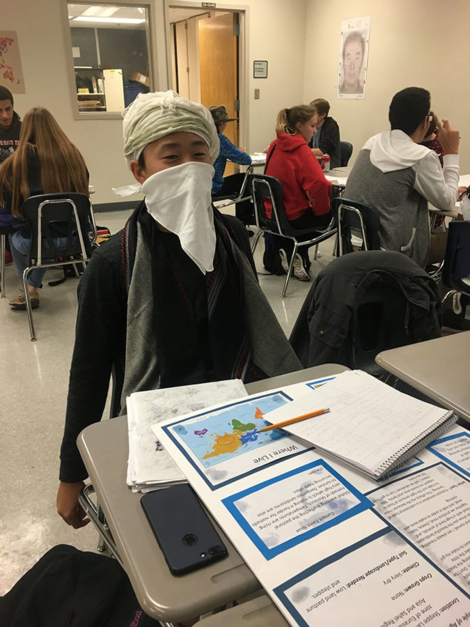 Freshman Nathan Lee dresses up as a pastoral nomad for extra credit in Carrie Foster’s class on Jan 16th. Foster assigned Lee pastoral nomadism to research and write about but dressing up is not mandatory.
