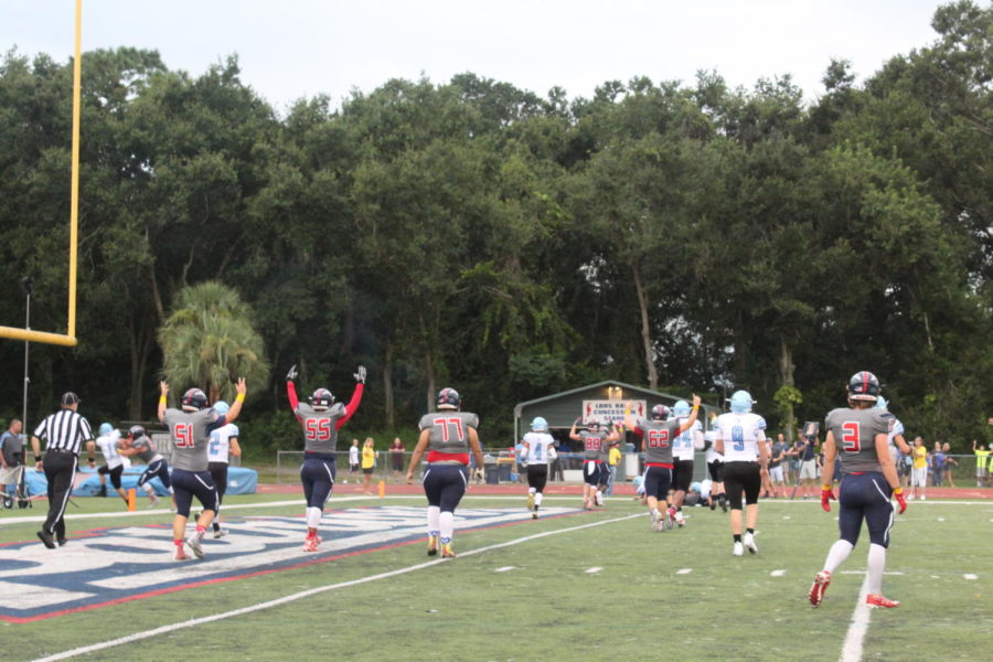 On Friday, August 24th, the Lake Brantley Varsity Football Team scores a touchdown against the Hagerty Huskies. The Patriots won the game at Tom Storey Field, 35-17.