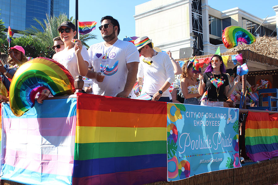 The City of Orlando employees celebrate PRIDE and hand out stickers on a float during  the pride parade. The LGBT+ community and allies celebrated Orlando Pride on Saturday, Oct. 13, at Lake Eola from 10 A.M. to 10 P.M.
