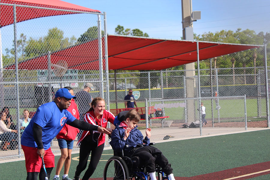 Assisting kids with special needs in America’s favorite pastime is a way that Reagan Sienkiewicz, a junior on the Varsity Softball team, and many of her teammates give back to the community. The Bambino Buddy Ball league provides the kids with an outlet to meet new people and teaches important social skills. “The most surprising aspect I have experienced is that I can have a big impact on the kids I help out,” Sienkiewicz said. “It might not seem like much, but I know it means the world to the kids and their parents.”