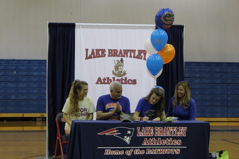 Ashley Klingenberg signs to the University of Florida on February 6th. Klingenberg was signing along with her mom, dad and twin sister.