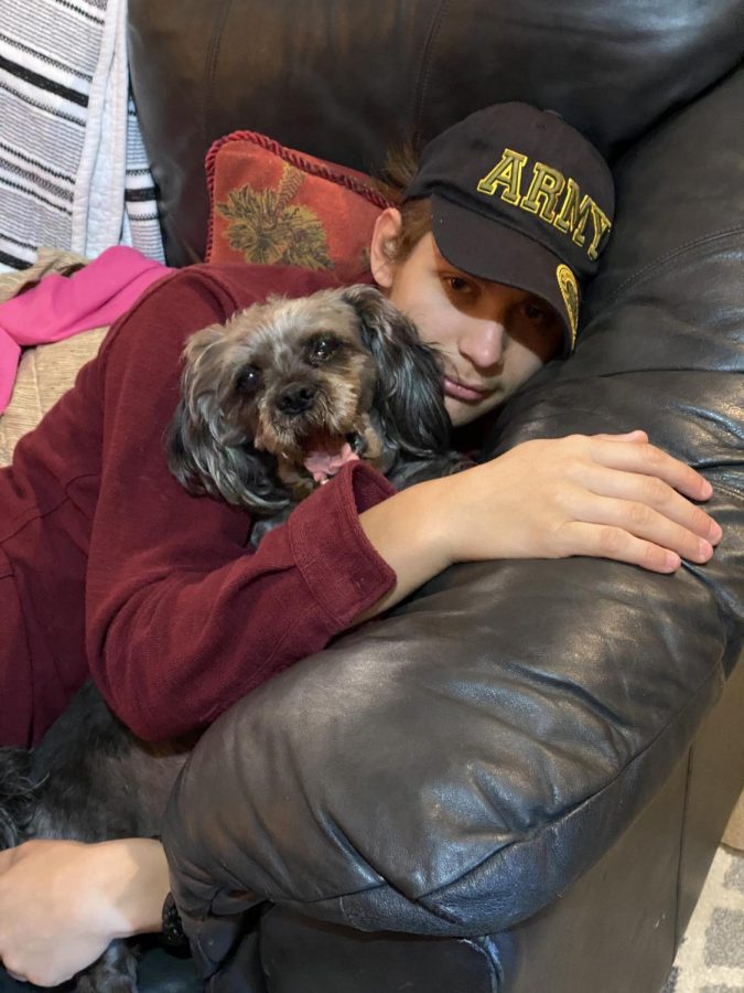 Senior Alexander Garofalo spends some long-overdue time with his dog, Simba. “I did not realize how little attention I have given my dog because I was always so preoccupied with either school or rowing,” Garofalo said. “With me being home all the time, I am constantly showering Simba in love, and he is just loving it.”