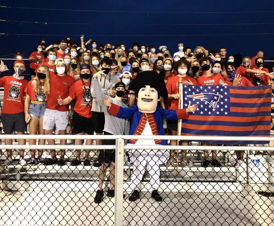 The student section cheers on the varsity football team on Thursday, Sept. 17. Face masks were encouraged in the stands, but social distancing was not enforced. The varsity football team suffered a narrow loss against Lake Mary High School and the final score was 15-14.
