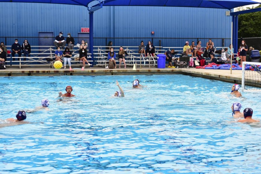 With the ball in the air, all eyes are looking up during a game on Wednesday, Feb. 17. The boys’ water polo team beat Apopka High School 31-7. The team played well this year, ending the season with only two losses. 