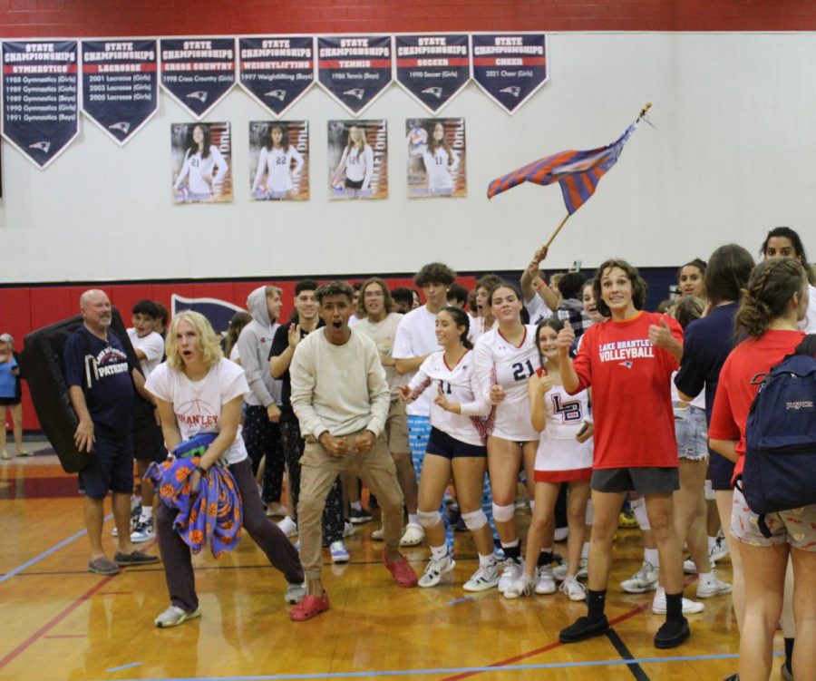 After taking the win, the student section crowds around the teammates to celebrate their win.  This spawned a moment of celebration and a swarm of plaid patterned pants. 