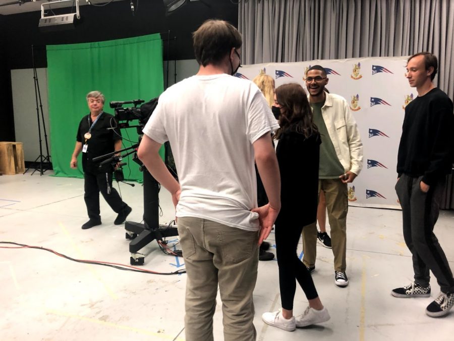 Members of Cinema Club converse in the TV Production room, where they will be working on their club film during meetings. “I feel like I’m gaining knowledge about the making of films and making new friends,” sophomore Hannah Waller said.