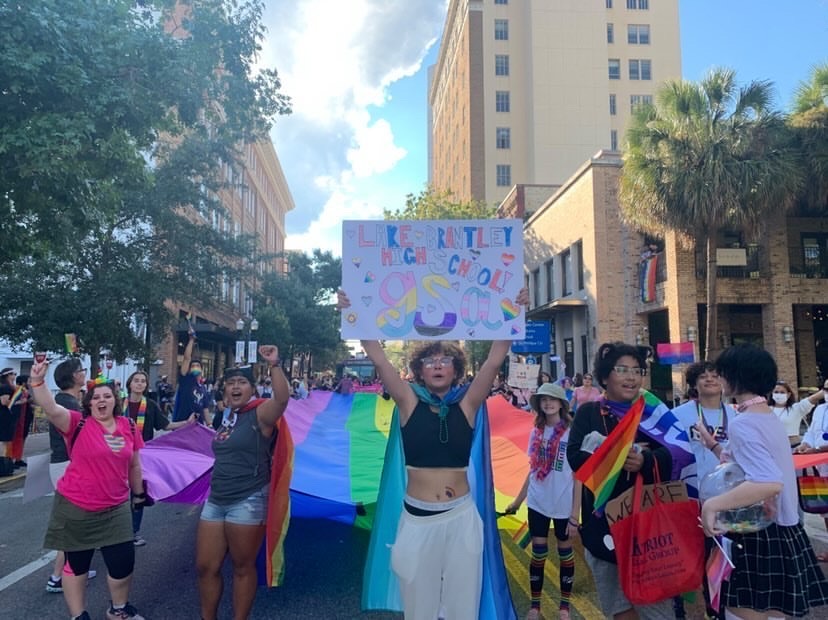 Members of GSA walk amongst members and allies of the LGBTQ+ community during the Come Out with Pride celebration on Oct. 9. “It was so special to be in such a supportive and welcoming environment.