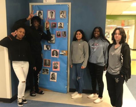 Students present their entry to the Black Student Unions (BSU) door decorating contest. The doors celebrate Black History Month, honoring the historic achievements that generations of African Americans have made.