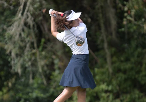 On Sept. 13, senior Sieana Banangada takes a swing in the varsity girls golf match against Winter Springs. Matches such as these lead up to the girls trip to regionals. 